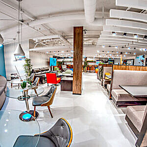 The Hidden Costs of Growth: Traditional "Triple Net" Leases vs. West Quay Private Offices 3 Lounge Area